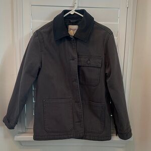 Army green barn, jacket with leather collar. Lined. Never worn.
